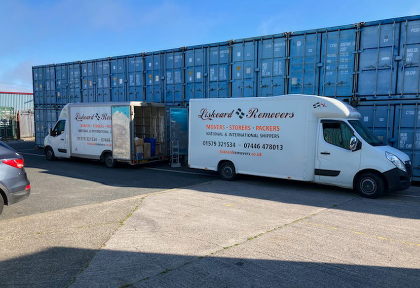 Vans parked outside storage facilities